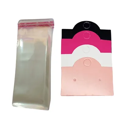 Saquinhos transparentes com aba adesiva e cartelas de brinco nas cores preta, pink, branca e rosé