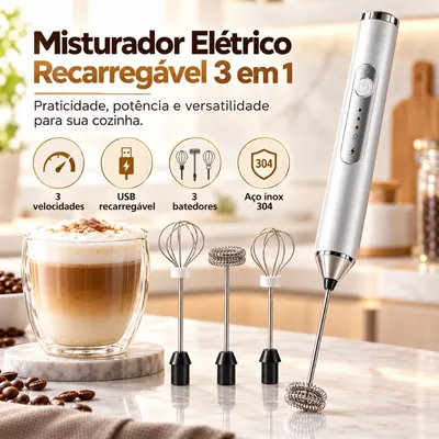 Mixer elétrico branco com ponteira em espiral, três batedores avulsos e copo de cappuccino sobre bancada de mármore