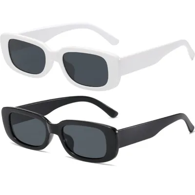 Dois óculos de sol retangulares estreitos, um com armação branca e outro preta, ambos com aro grosso e lentes cinza-escuras