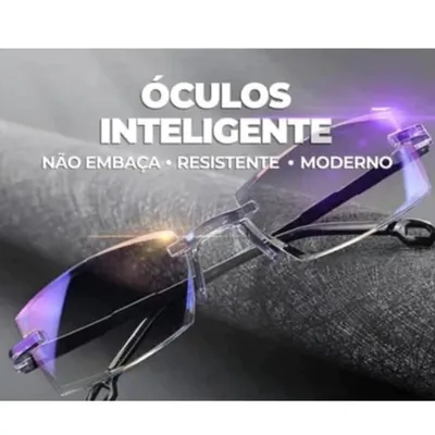 Óculos sem aro com lentes de borda facetada e reflexo arroxeado, ponte transparente e hastes finas sobre tecido cinza